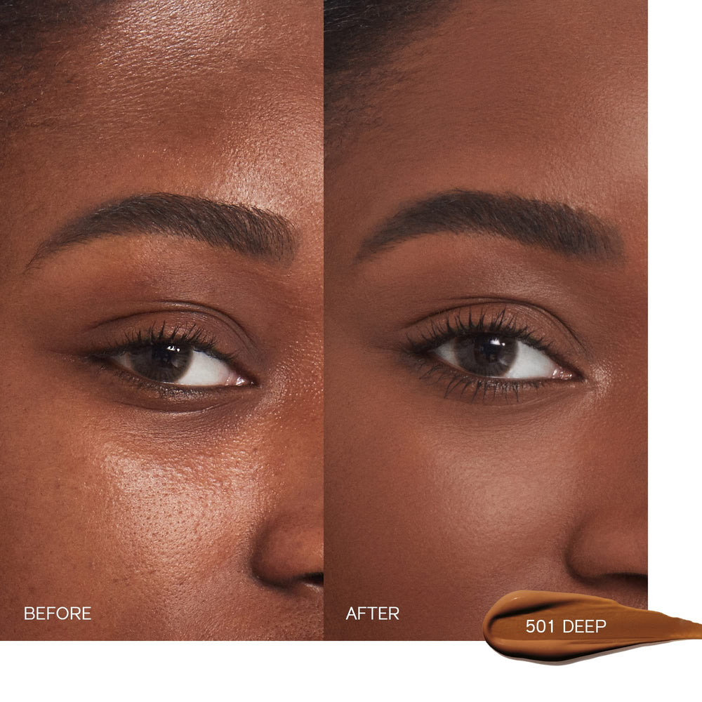 Shiseido Synchro Skin concealer application with ring finger for seamless blending.