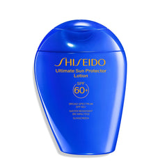 Shiseido Ultimate Sun Protector Lotion bottle close-up showing invisible SPF for all-day protection.
