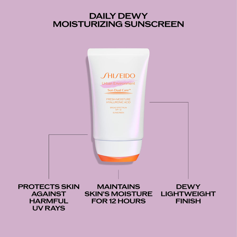 Applying Shiseido Urban Environment sunscreen to hand for daily protection before makeup.