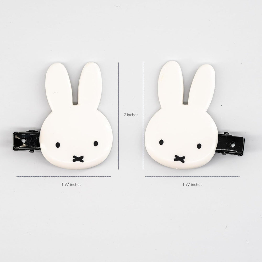 SHOBIDO Miffy die-cut bangs clip held in hand for scale and feel.