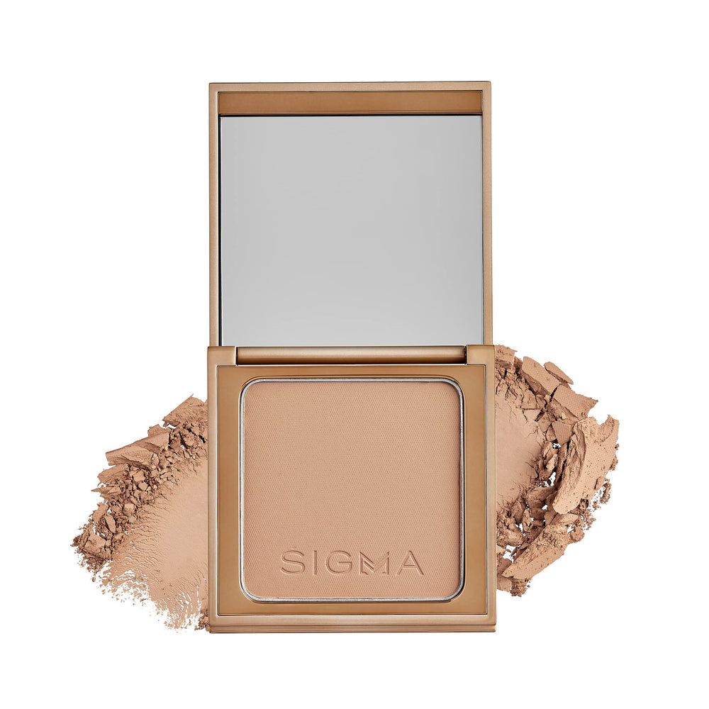 Sigma Beauty bronzer swirls on cheek for natural warmth