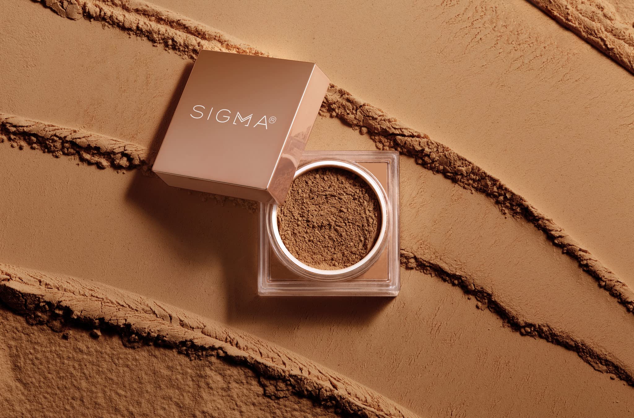 Sigma Beauty compact packaging closeup communicates clean, vegan cruelty-free formula.