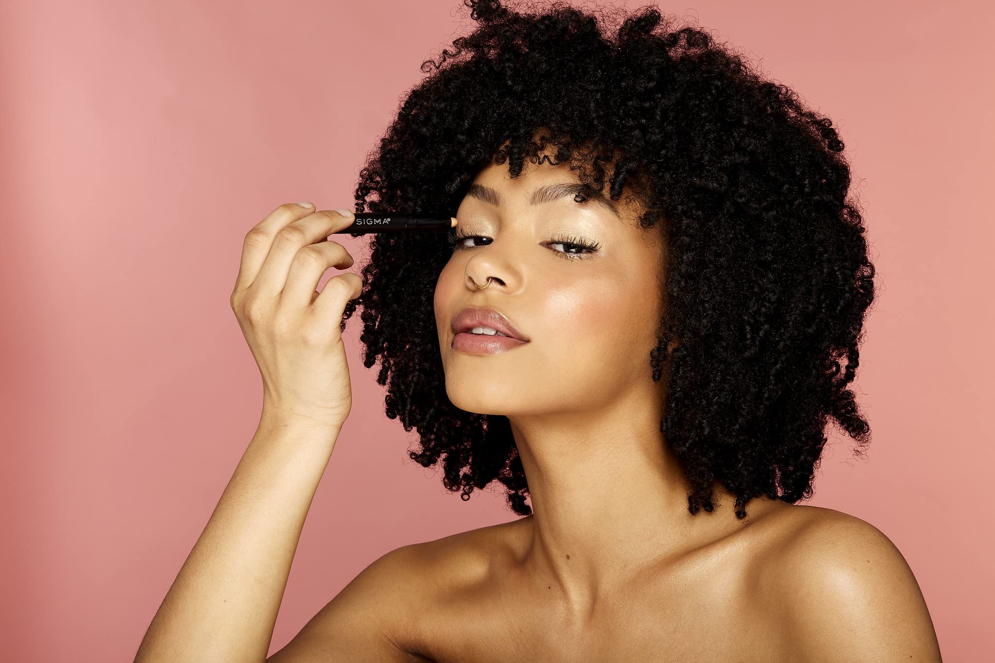 Sigma Beauty Professional-grade primer base supports long-wear eye looks.