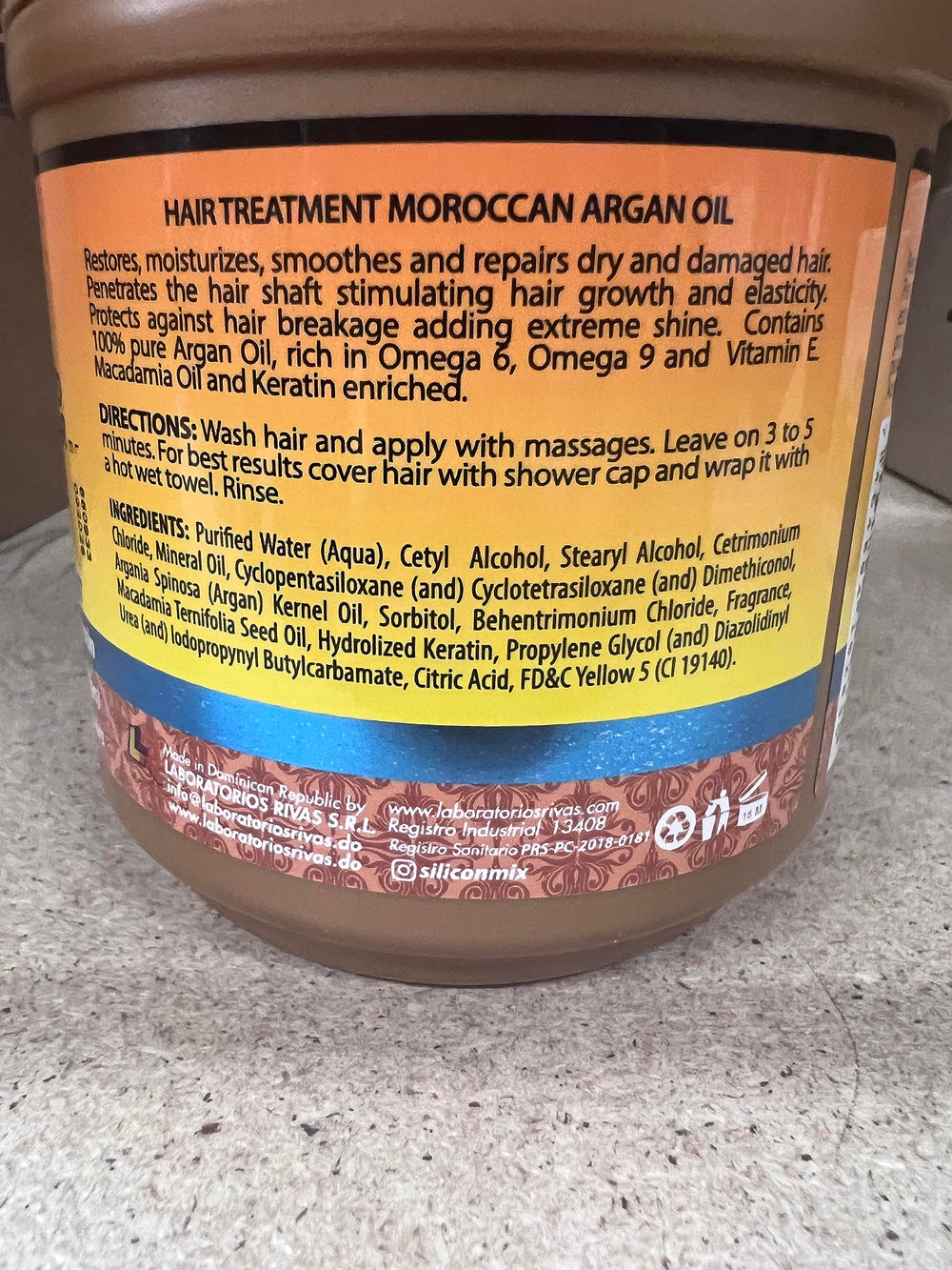 Silicon Mix Moroccan Argan Oil bottle close-up showing hair gloss and nourishment
