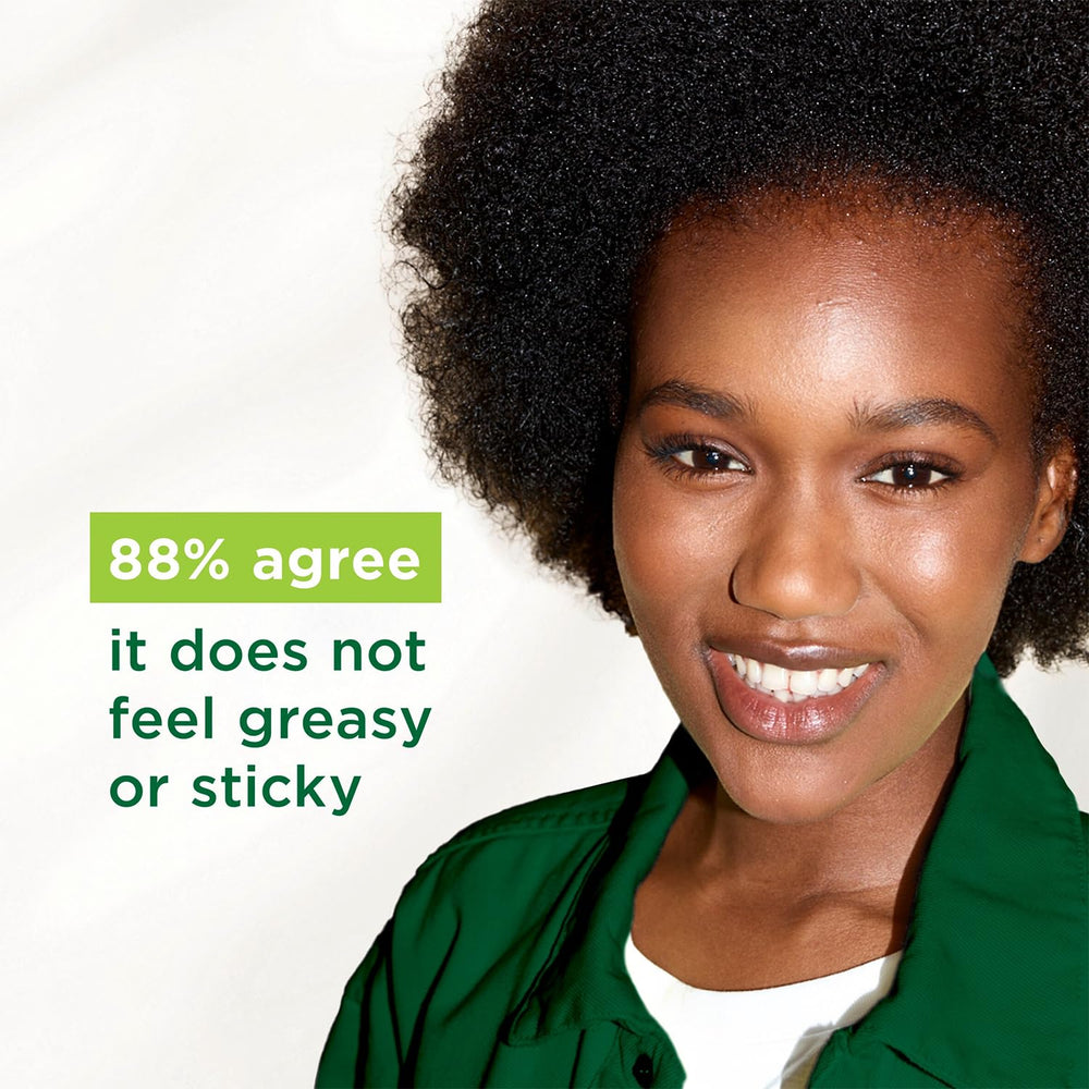 Applying Simple Replenishing Rich Moisturiser on the cheek demonstrates smooth spread