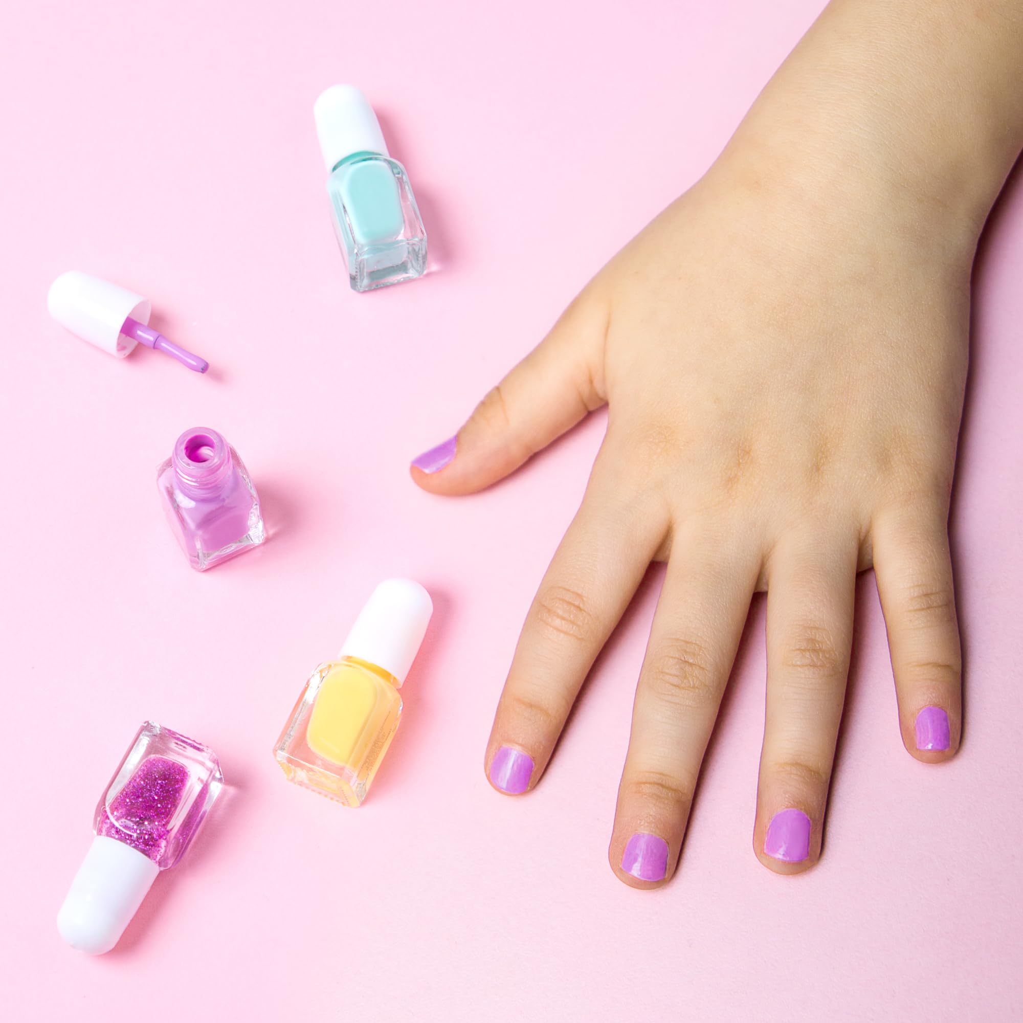 SIMPLE PLEASURES unicorn-pink packaging enhances a delightful gift experience.