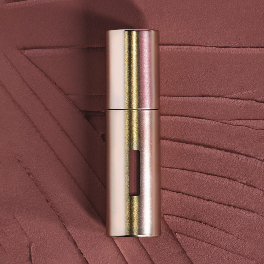 Sisley Color Cloud tawny applicator close-up for effortless, precise lip and cheek application.