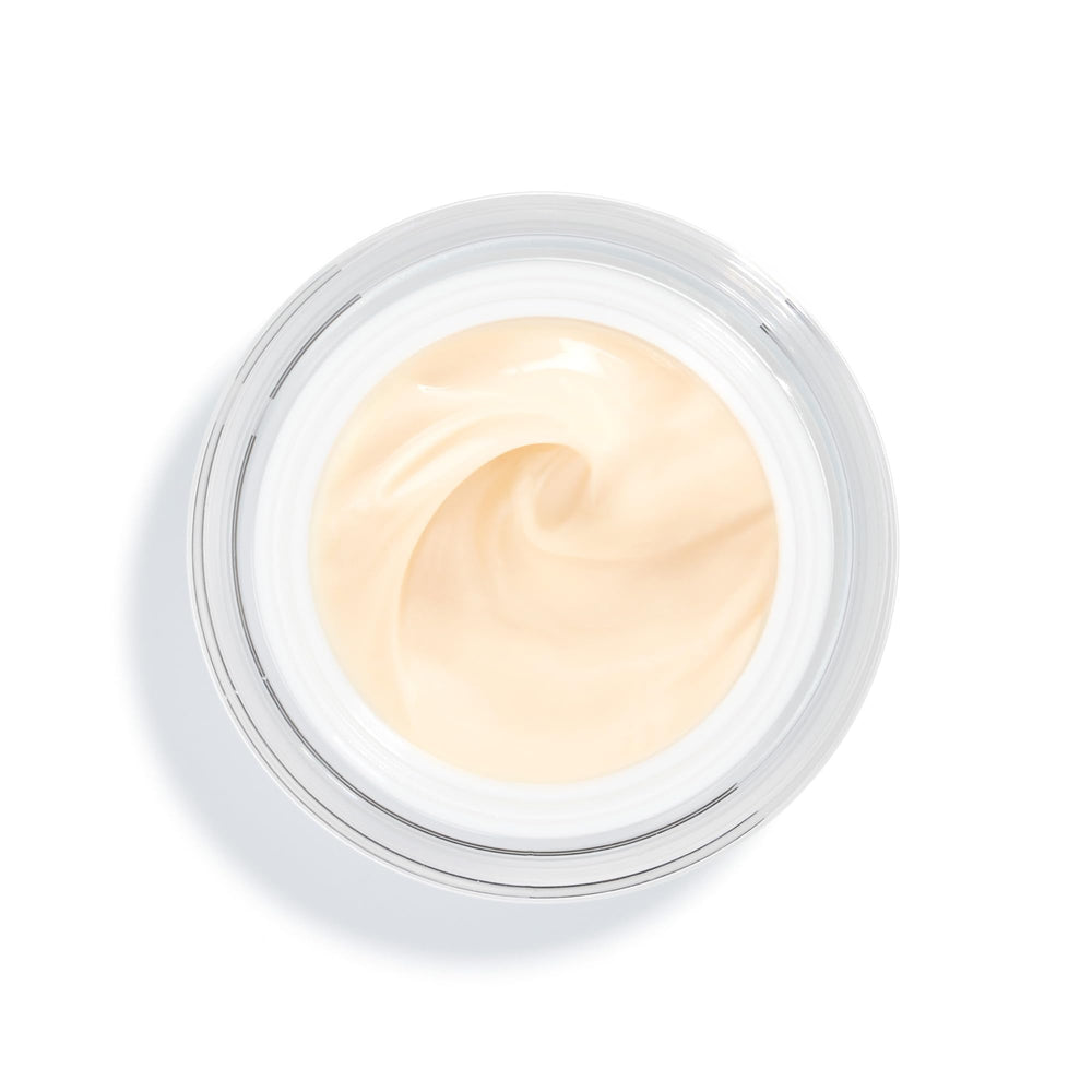 Atlas Cedar & Pomegranate Fermented Extracts illuminate dark circles.