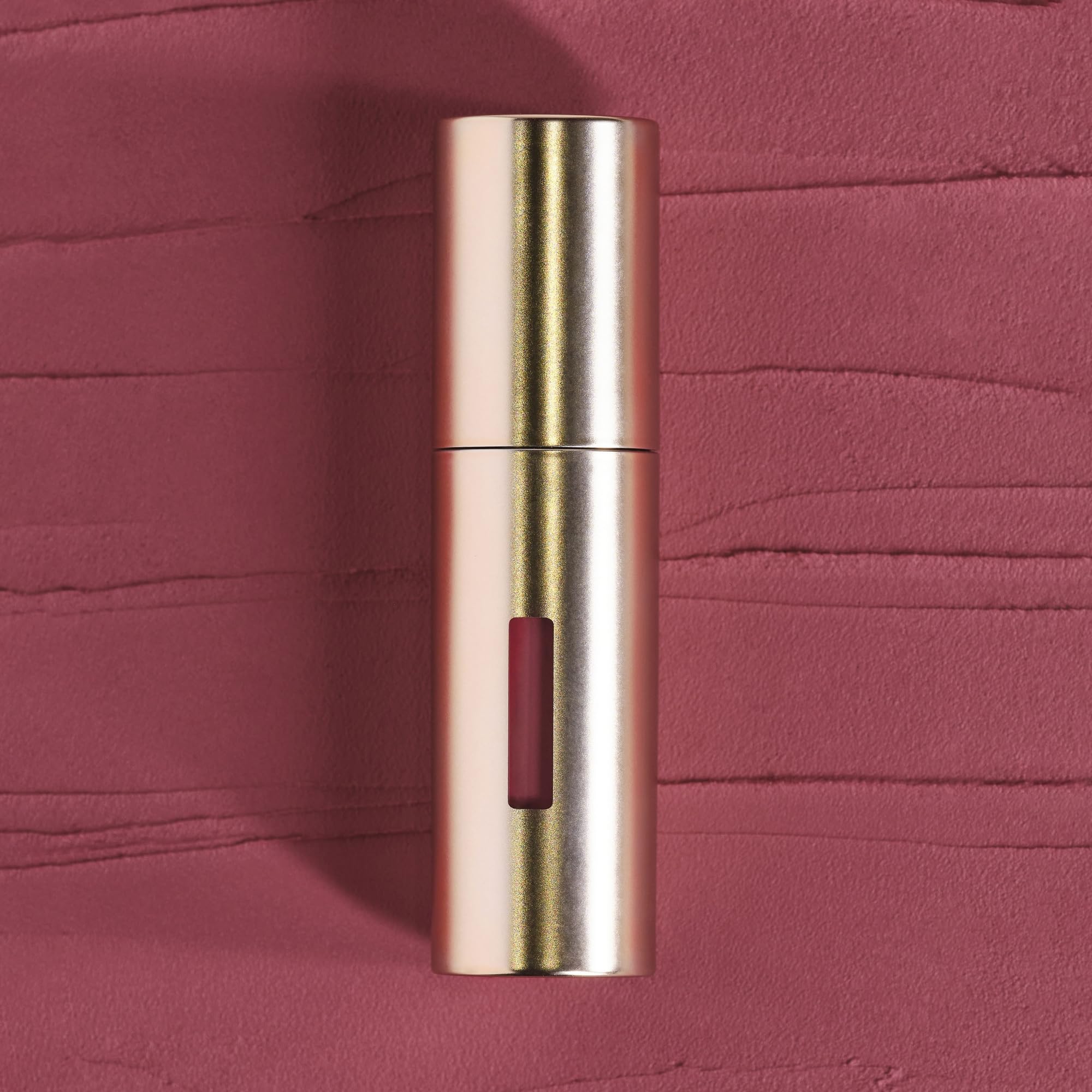 Lip application closeup highlights soft-matte finish and featherweight feel for smooth lips