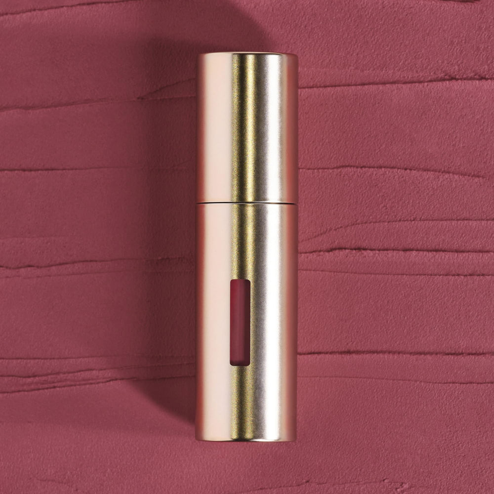 Lip application closeup highlights soft-matte finish and featherweight feel for smooth lips