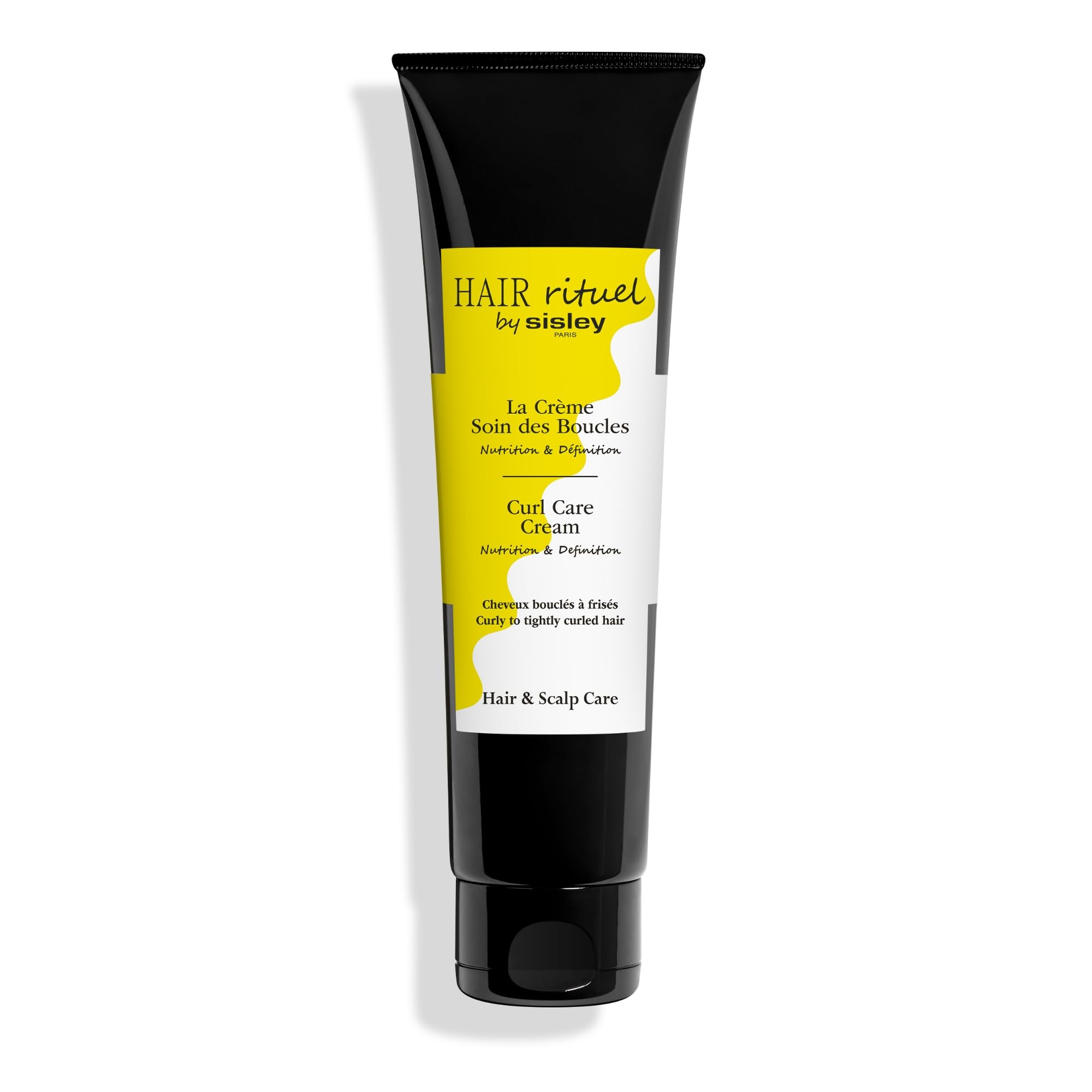 Sisley Paris Curl Care Cream bottle showcases nourishing formula for curly hair.