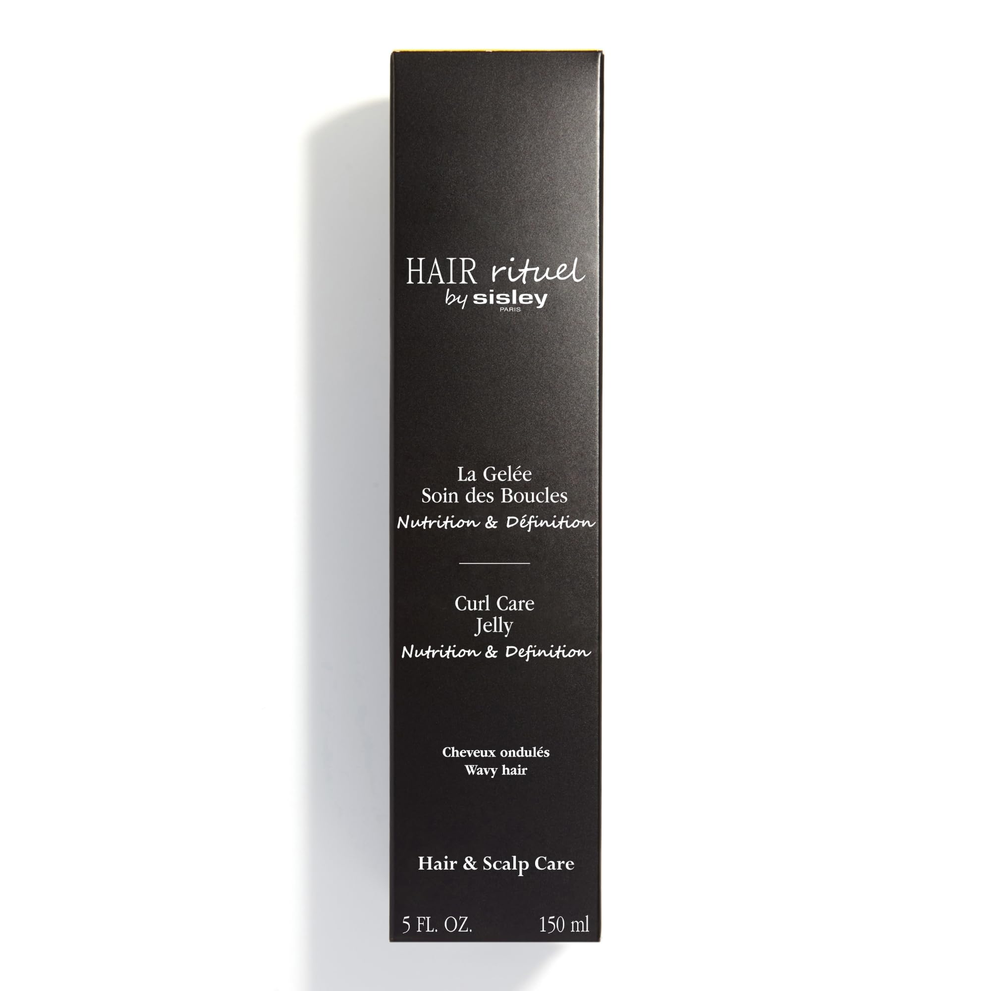 Humid-weather styling with Sisley Paris Curl Care Jelly shows frizz control.