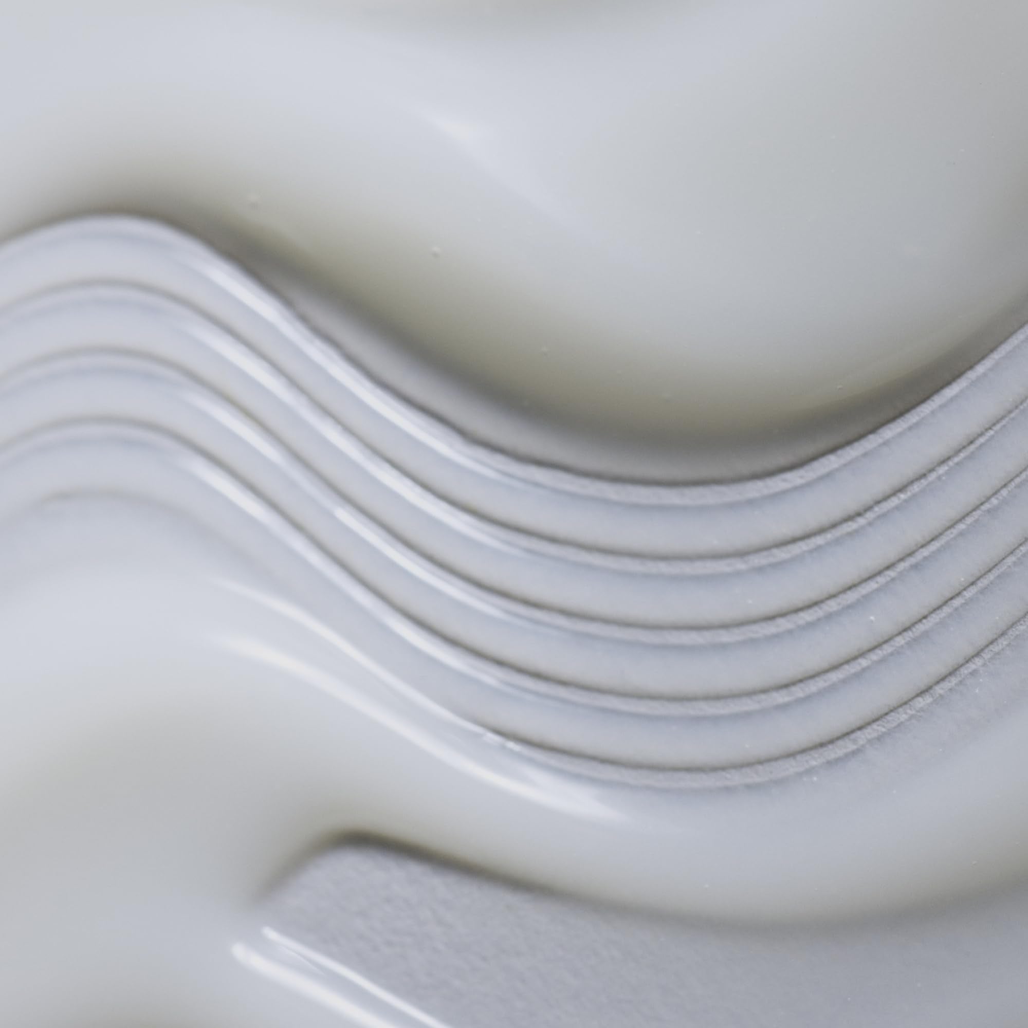 Sisley Paris Curl Care Jelly texture on hand demonstrates creamy, smooth application.