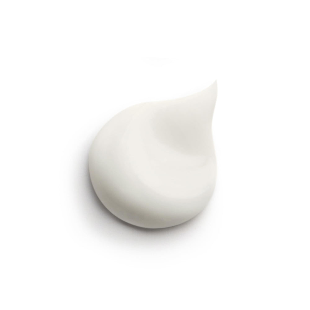 Close-up of the cream texture showing a non-greasy, matte finish from Sisley Paris Ecological Compound.