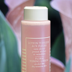 Sisley Paris Floral Toning Lotion bottle highlights rose and cornflower ingredients for soothing.