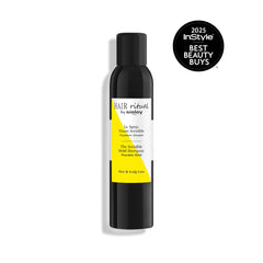 Sisley Paris invisible hold spray mist closeup for lightweight, voluminous finish.