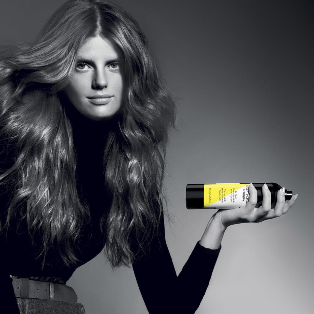 Sisley Paris invisible hold spray finish for shiny, smooth hair.