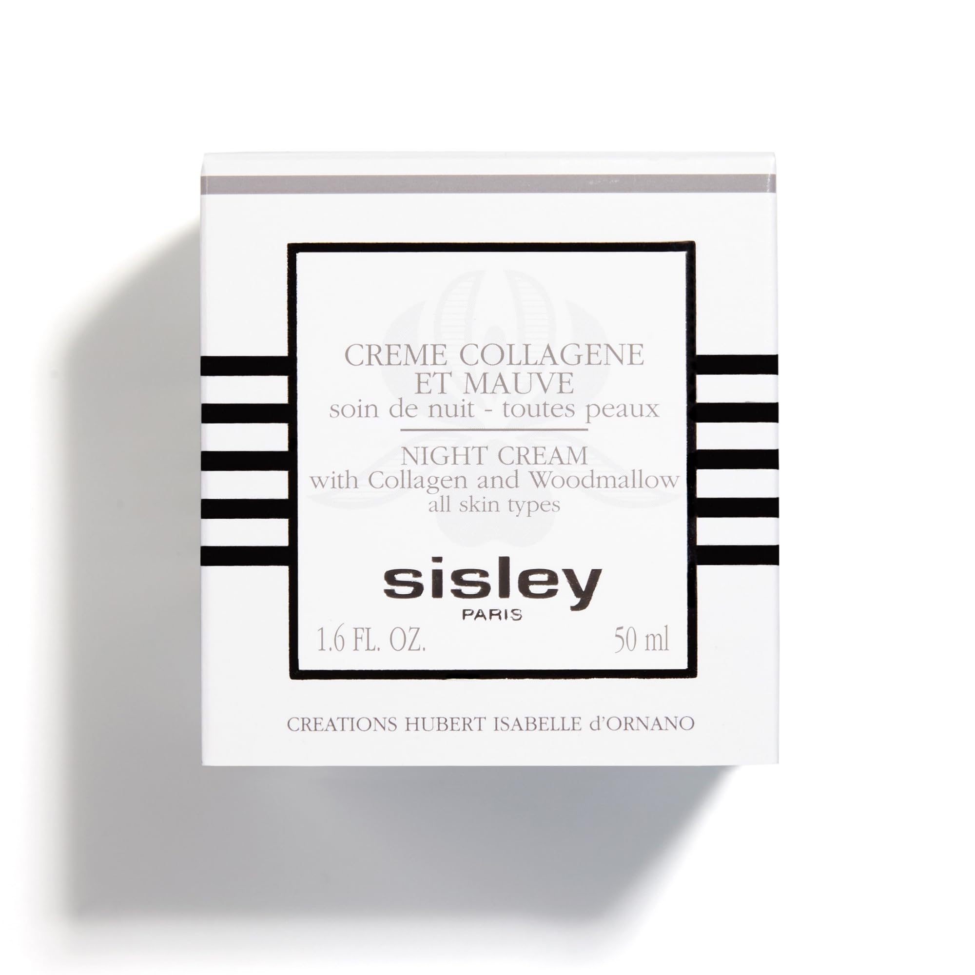 Nighttime routine scene with Sisley Paris night cream at bedside.