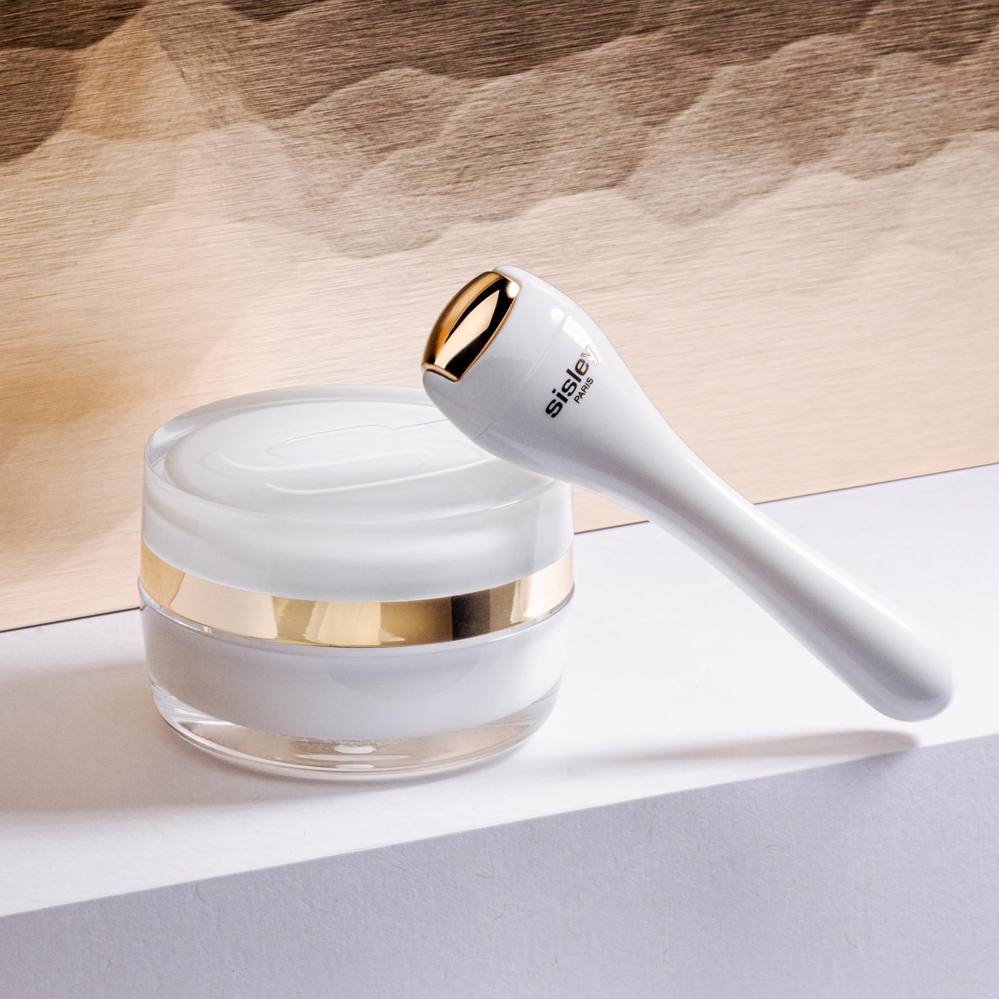 Sisley Integral Eye Cream with Persian Acacia for soothing and brightening.