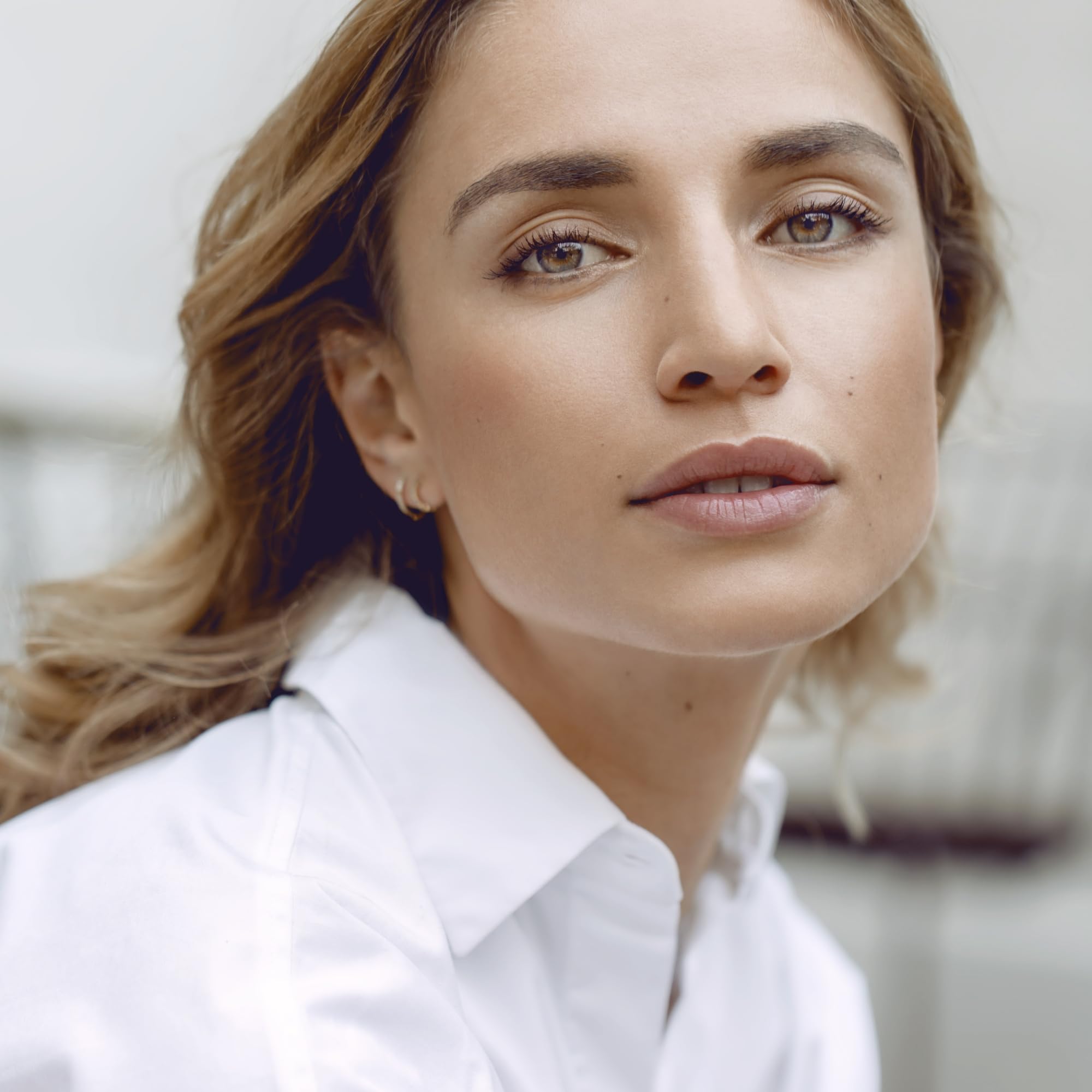 Sisley Paris Phyto-Hydra Teint glided with fingertips for a light, even complexion.