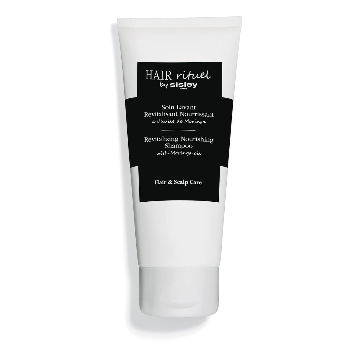 Sisley Paris Revitalizing Nourishing Shampoo bottle with Moringa Oil for moisturizing care