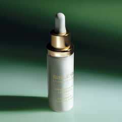 Sisley Paris Sisleya L'Integral Anti-Age Serum applied to the face during routine.