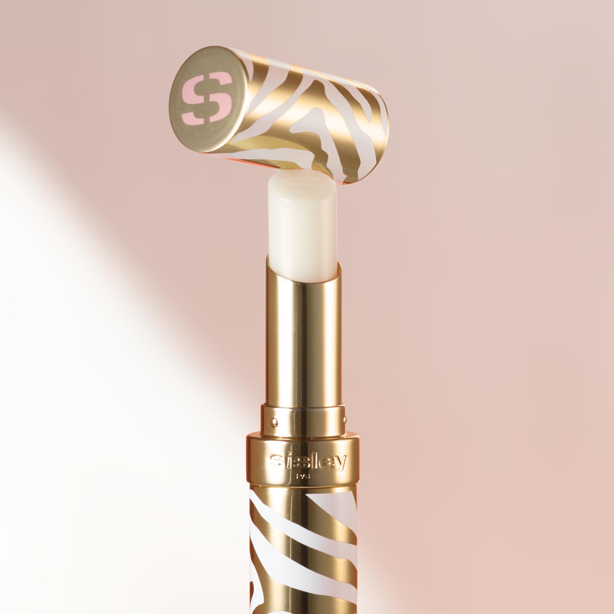 Buildable color swatch demonstrates versatile application on lips.
