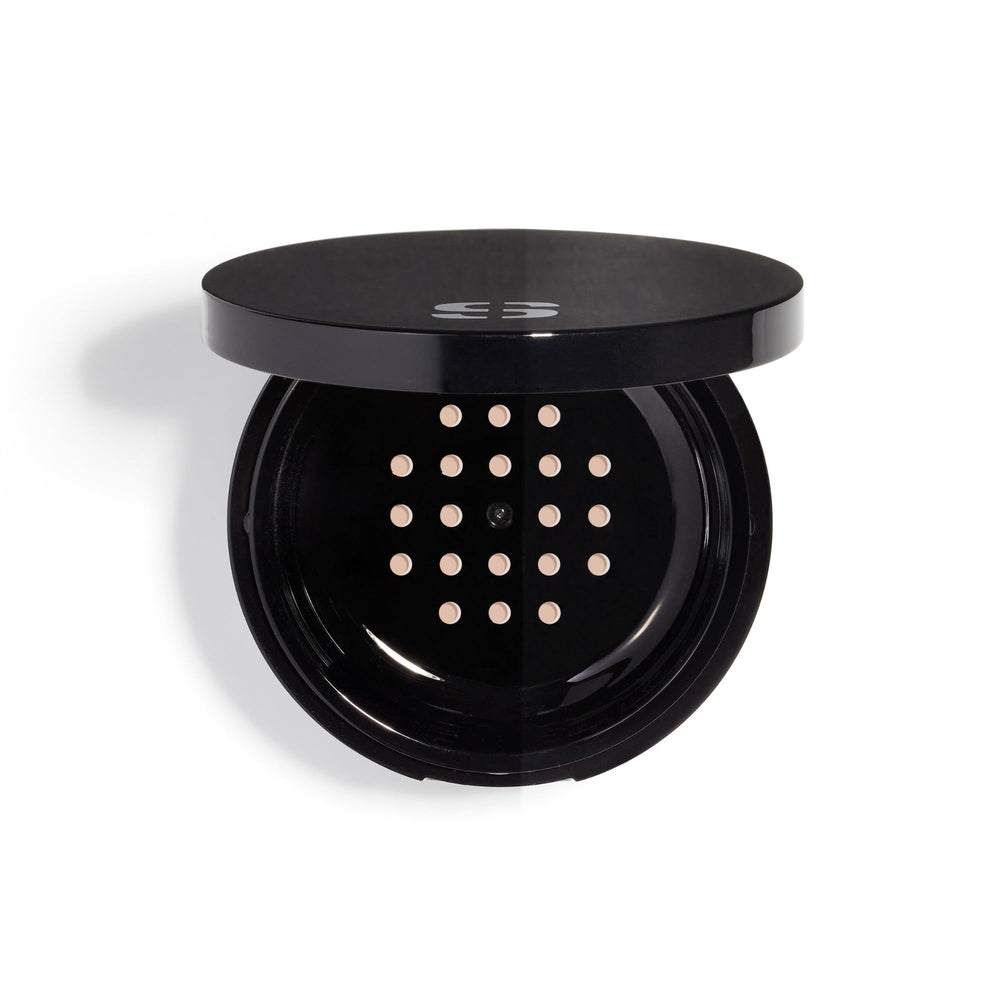 Sisley Phyto-Poudre Libre compact with mirror for on-the-go matte finish.