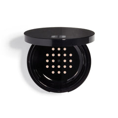 Sisley Phyto-Poudre Libre compact with mirror for on-the-go matte finish.