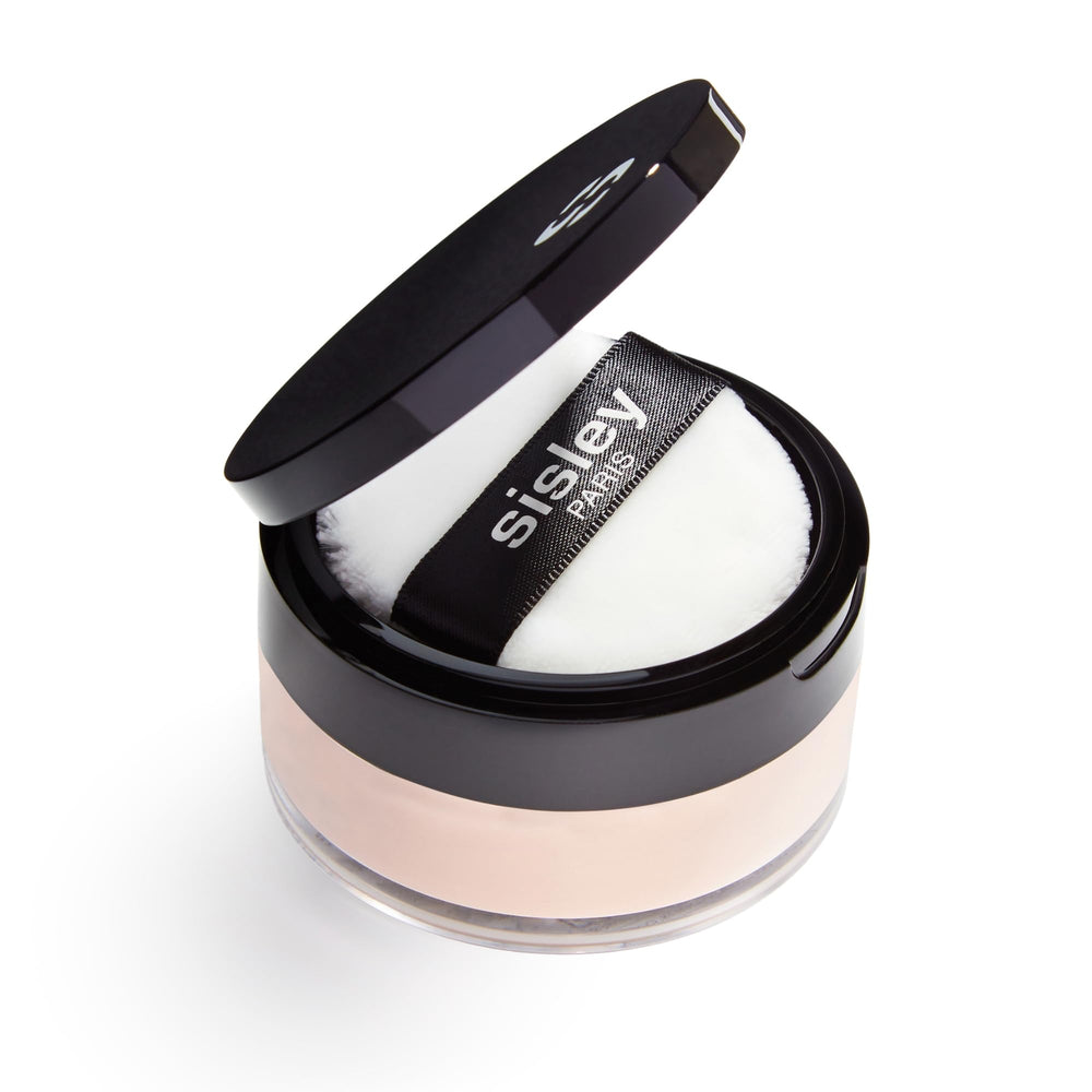 Sisley Phyto-Poudre Libre Rose Orient puff application for seamless, translucent finish.