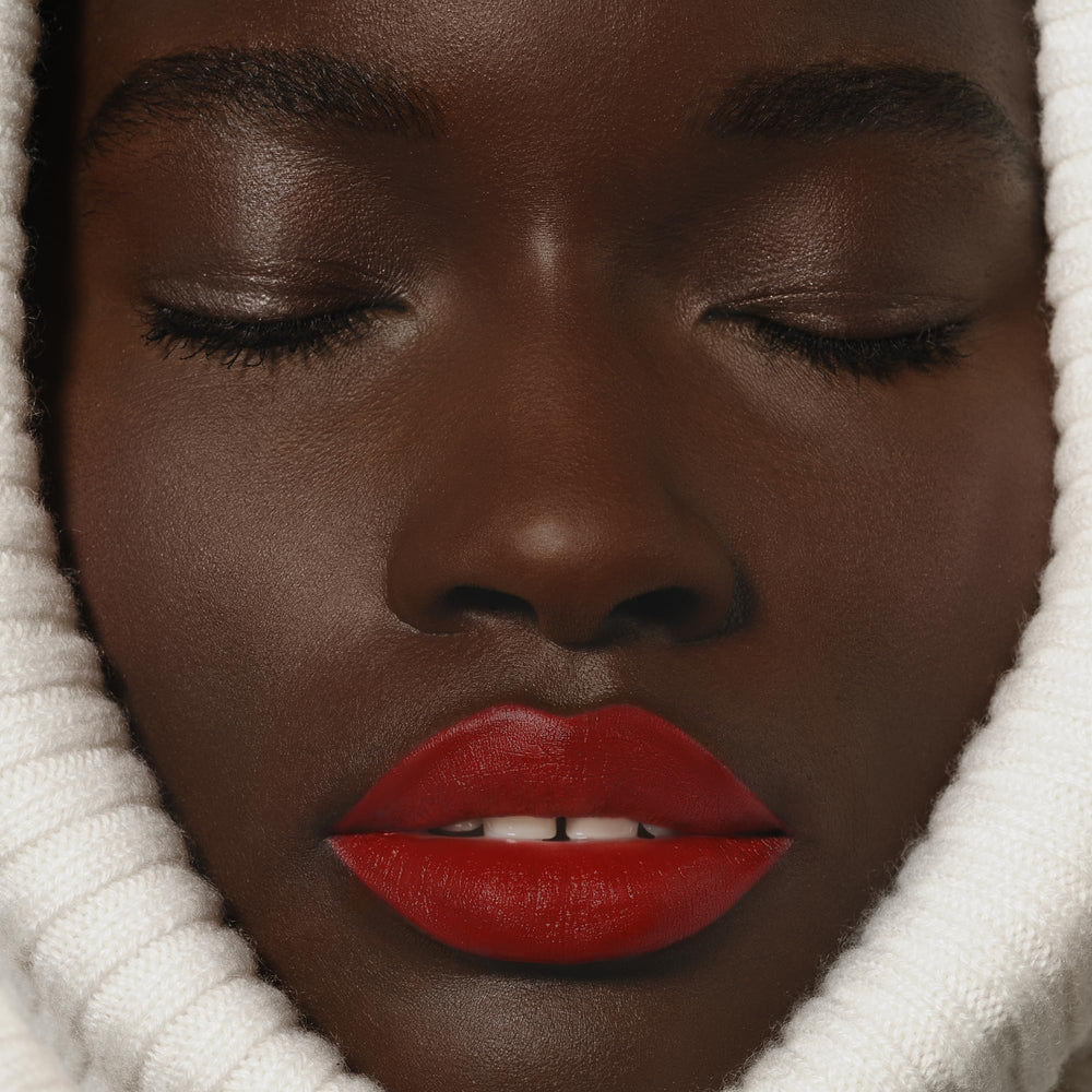 Sisley Phyto-Rouge Velvet Ardent on lips shows soft, velvety finish.
