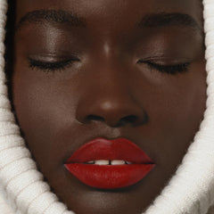 Sisley Phyto-Rouge Velvet Ardent on lips shows soft, velvety finish.