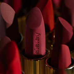 Application motion with Sisley Rose Punch shows smooth lip color glide