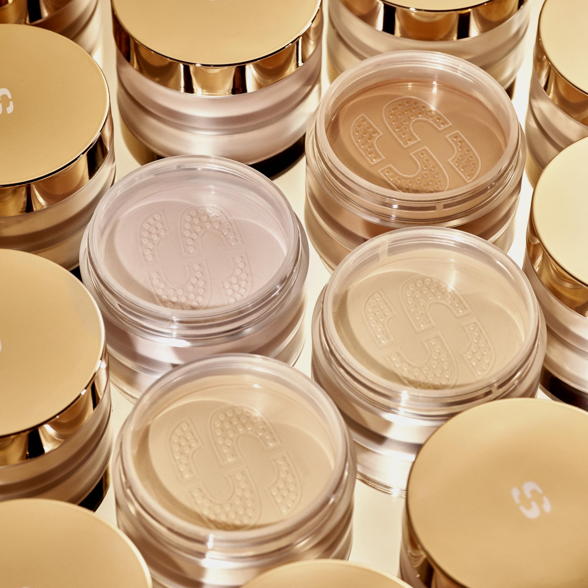 Sisley Paris Phyto-Teint Poudre Libre Deep 4 on foundation for lasting matte finish.