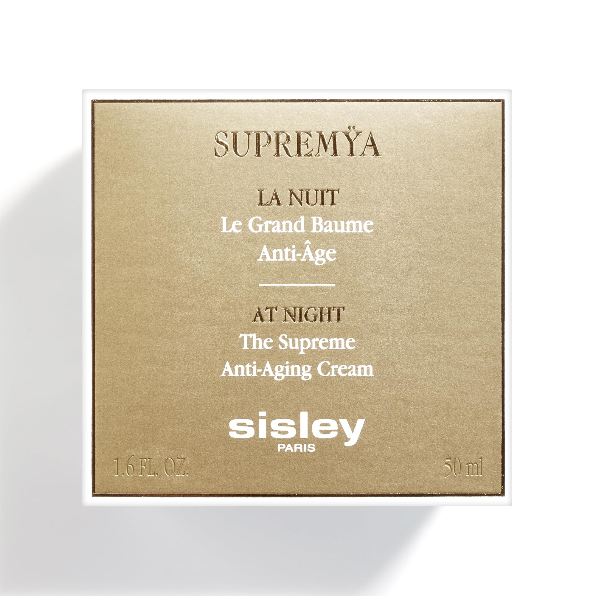 Spa-like bathroom scene with Supremya at Night on a marble counter