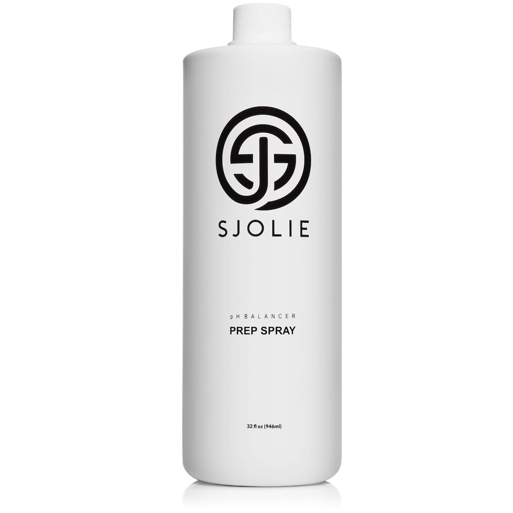 SJOLIE Sunless pH Balancing Spray bottle emitting a fine mist for skin prep.
