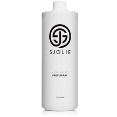 SJOLIE Sunless pH Balancing Spray bottle emitting a fine mist for skin prep.