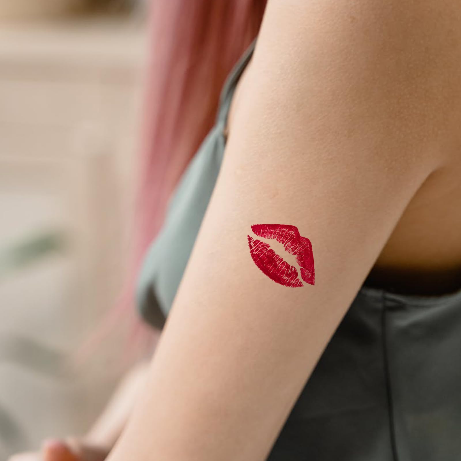 Skedimu lip tattoo kiss print close-up showing bold red pink design.