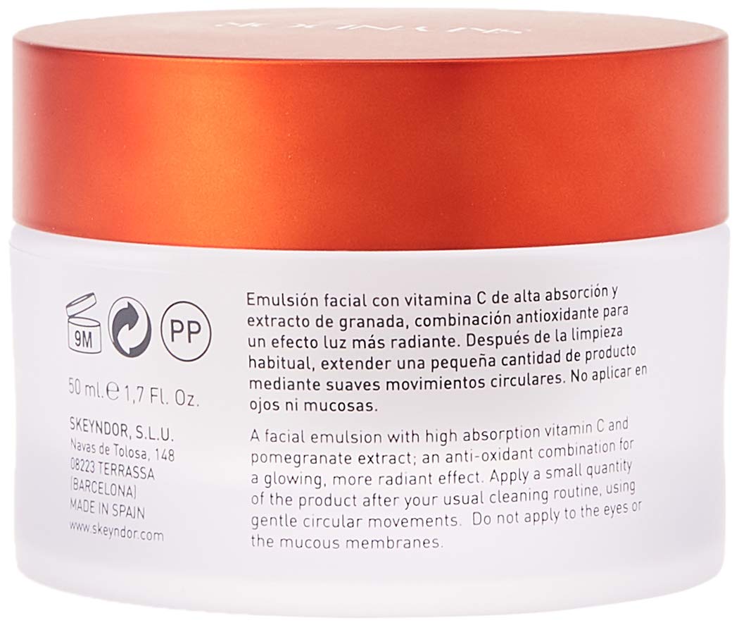 Skeyndor Power C+ energizing emulsion texture on hand showing fast-absorbing formula for daily use