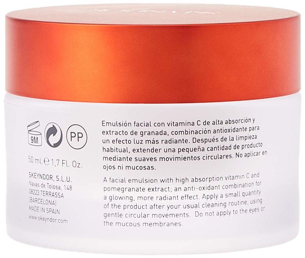 Skeyndor Power C+ energizing emulsion texture on hand showing fast-absorbing formula for daily use