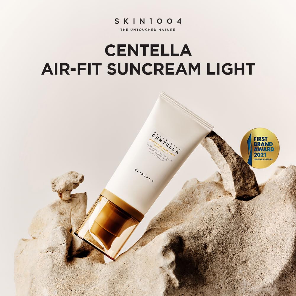 Ultra-light cream texture close-up with minimal white cast for SKIN1004 Suncream Light