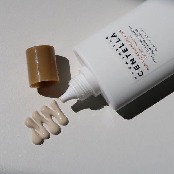 Close-up of SKIN1004 Madagascar Centella Air-fit Suncream Plus pump texture for soothing, smooth application.