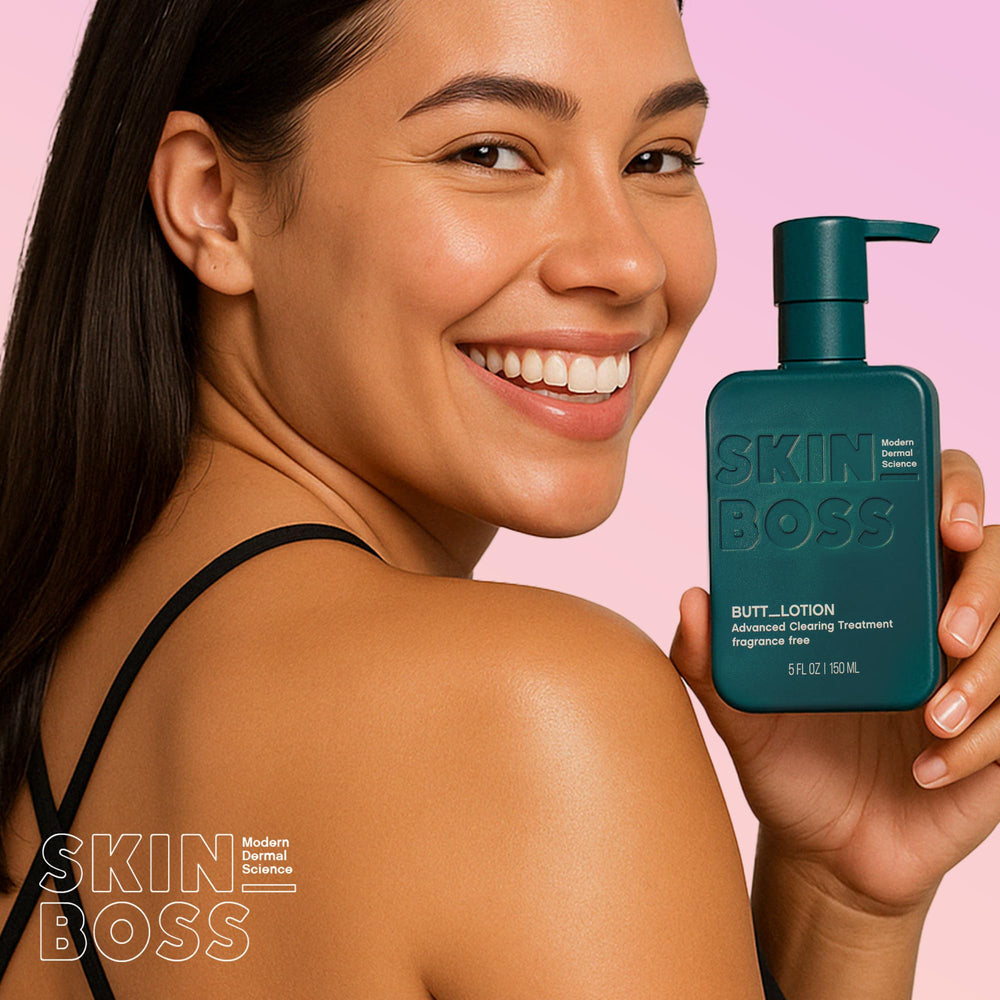 Hand applying SKINBOSS Butt Acne Clearing Treatment for easy coverage