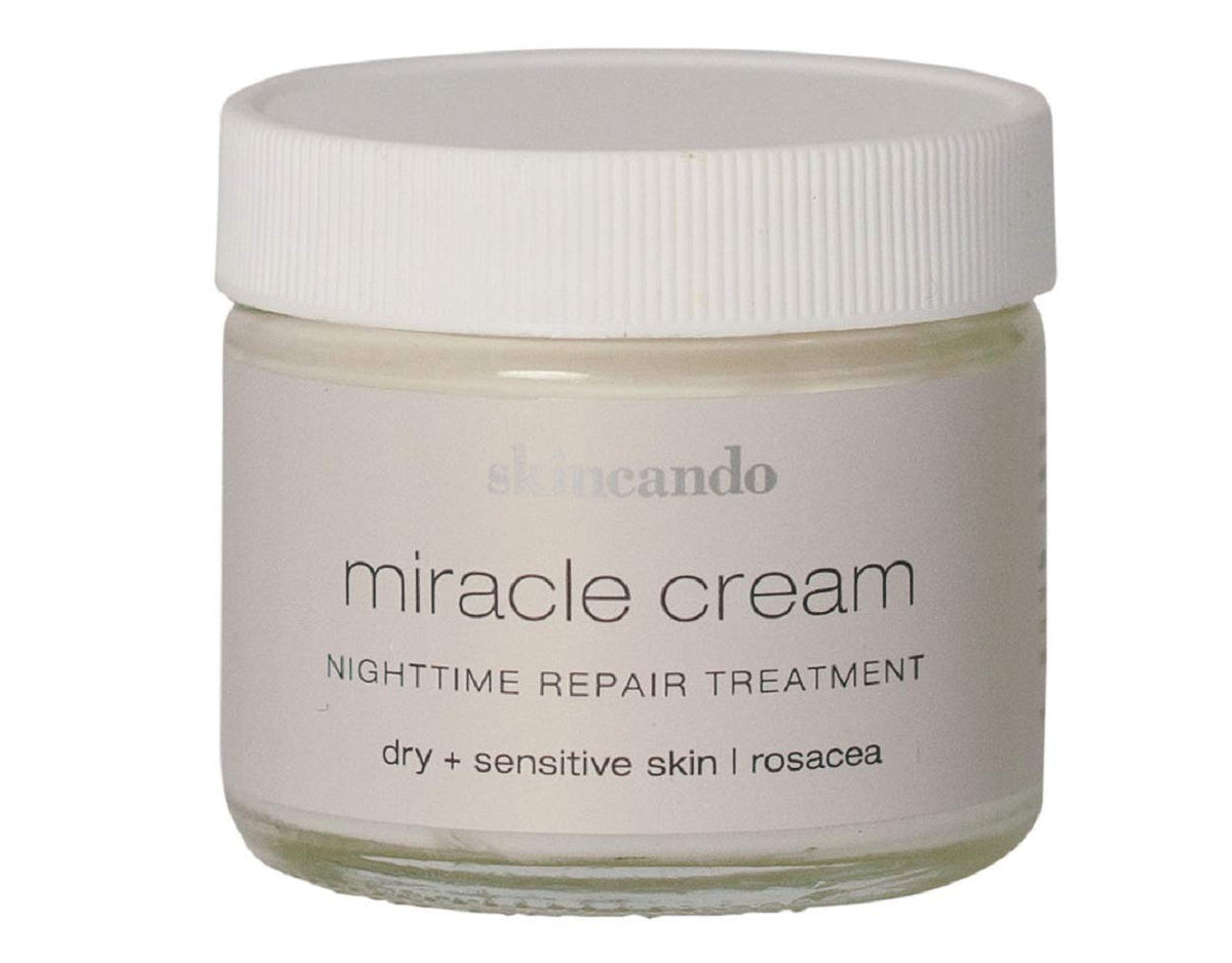 Skincando Miracle Moisturizer Cream jar closeup shows natural organic ingredients for all-over hydration.