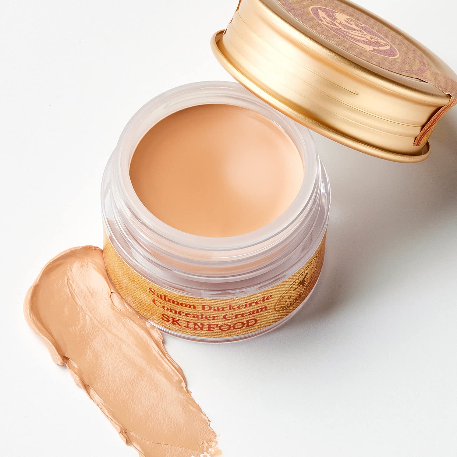 SKINFOOD Salmon Concealer with retinol supports smoother-looking skin over time