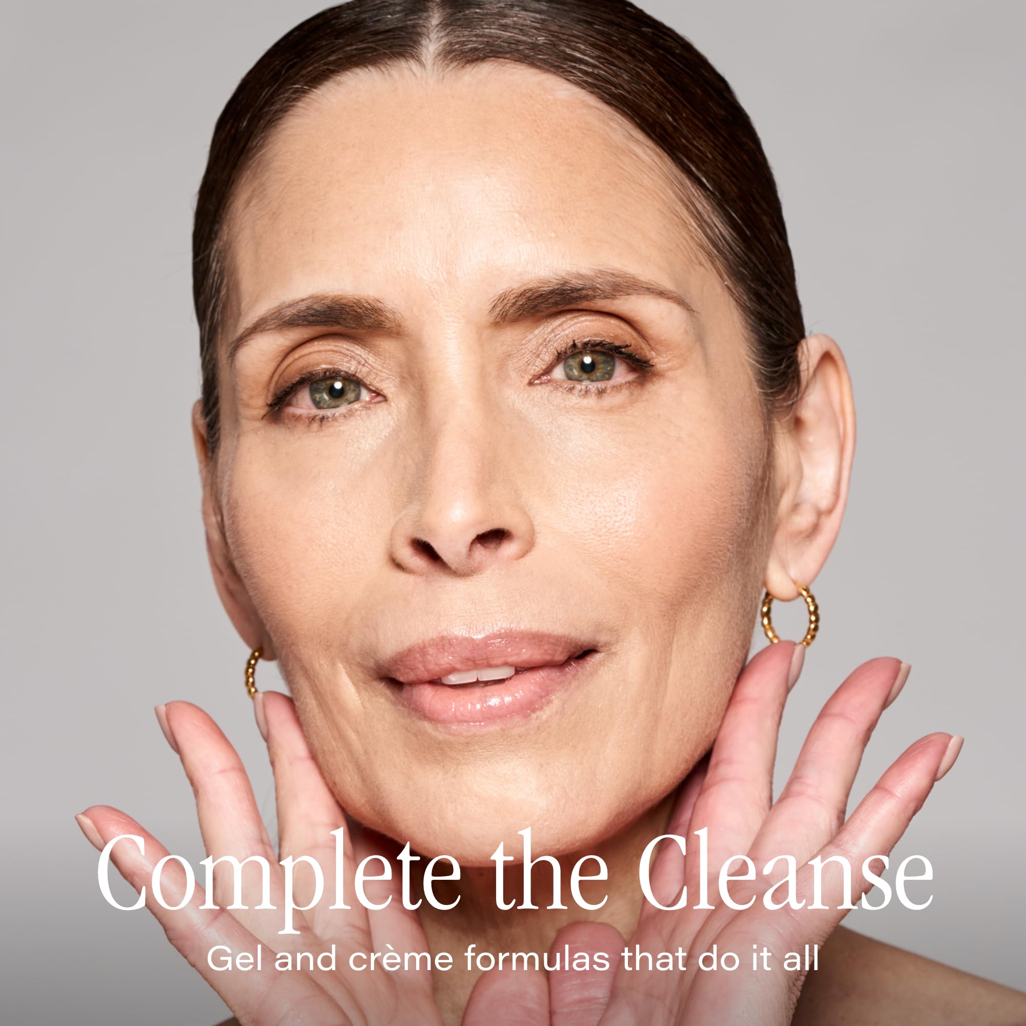 Close-up of SKINN Day & Night Face Wash foam showing gentle exfoliation.