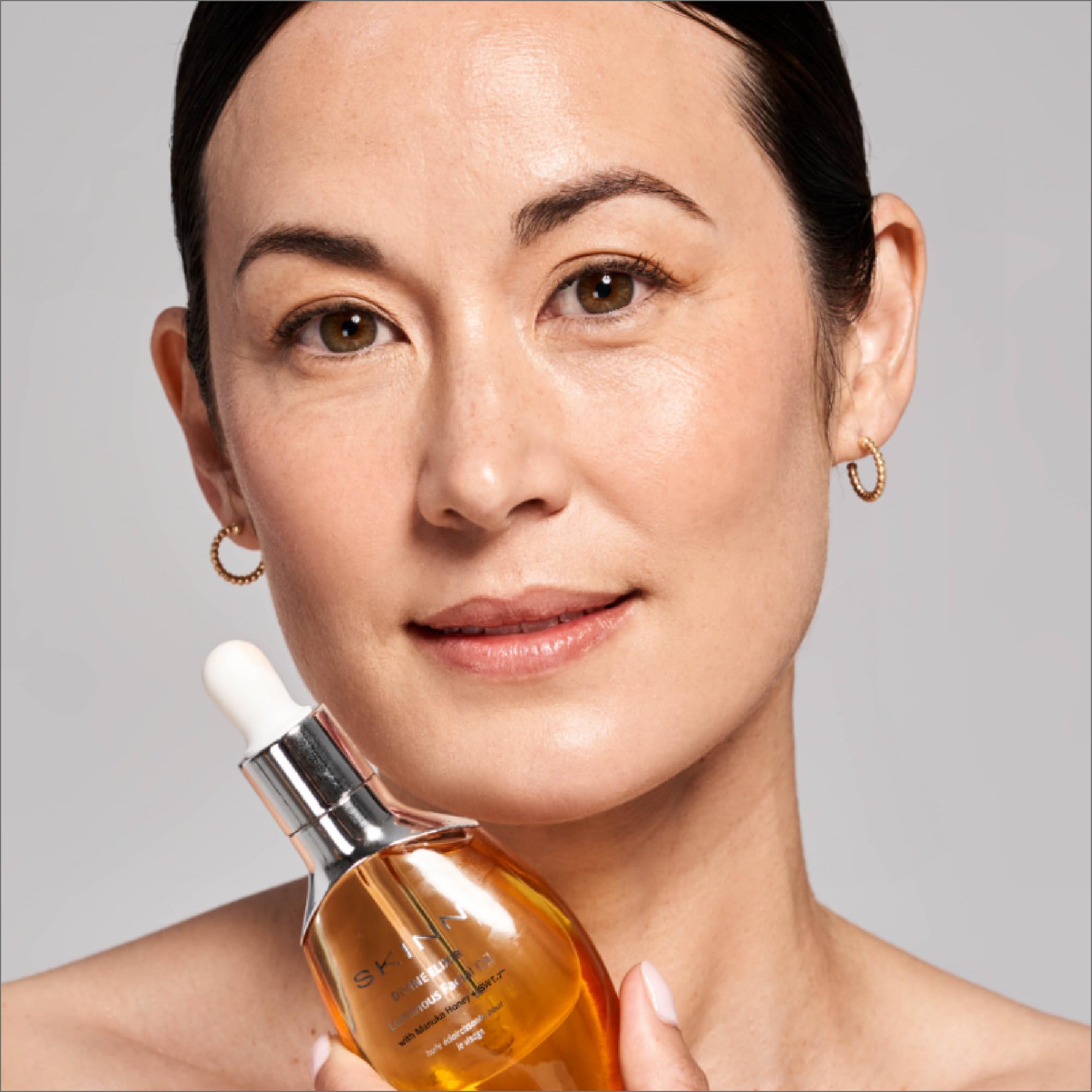 SKINN luminous face oil with Manuka honey highlights nourishing, brightening-inspired care