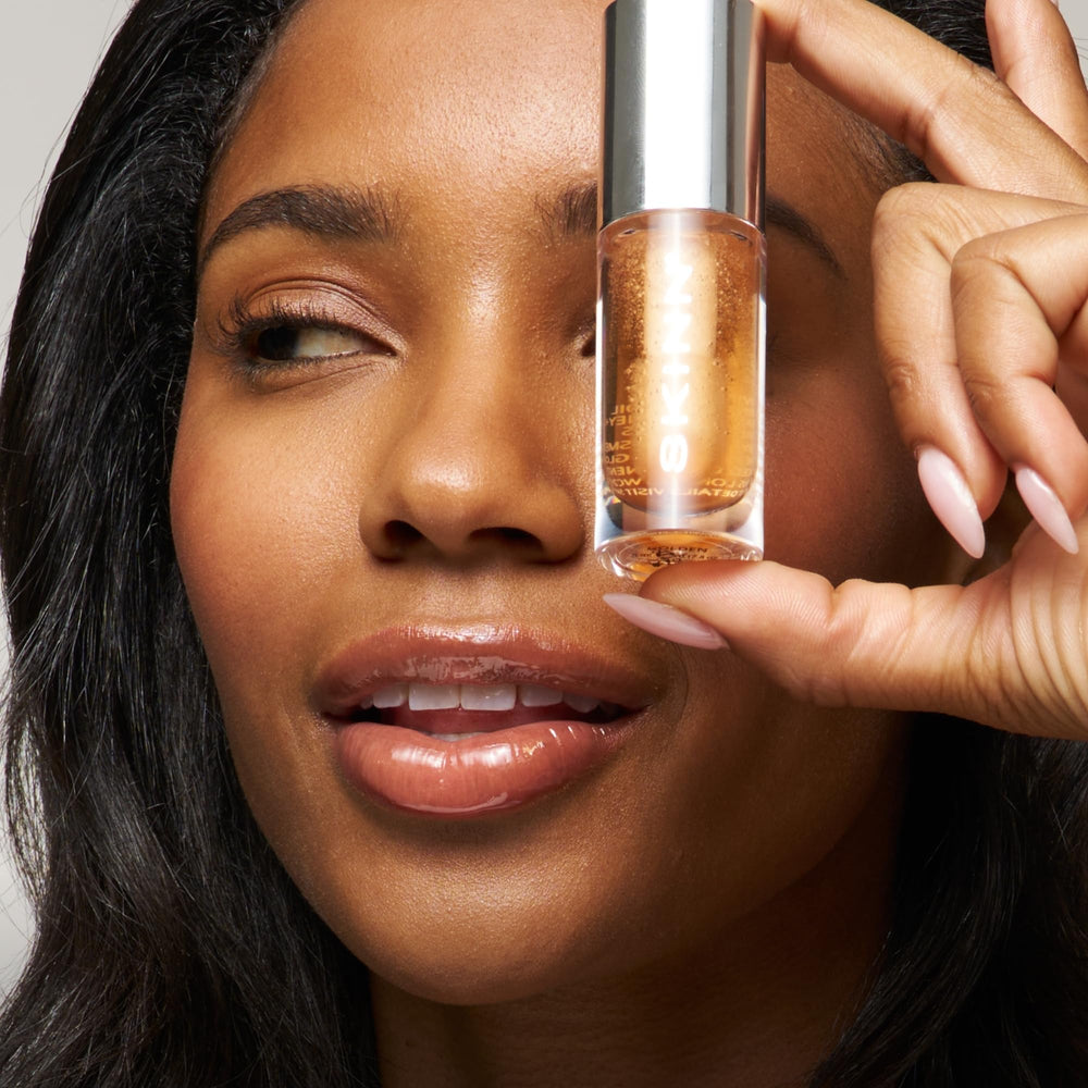 SKINN Luminous Lip Oil Golden holiday packaging makes a gift-ready treat