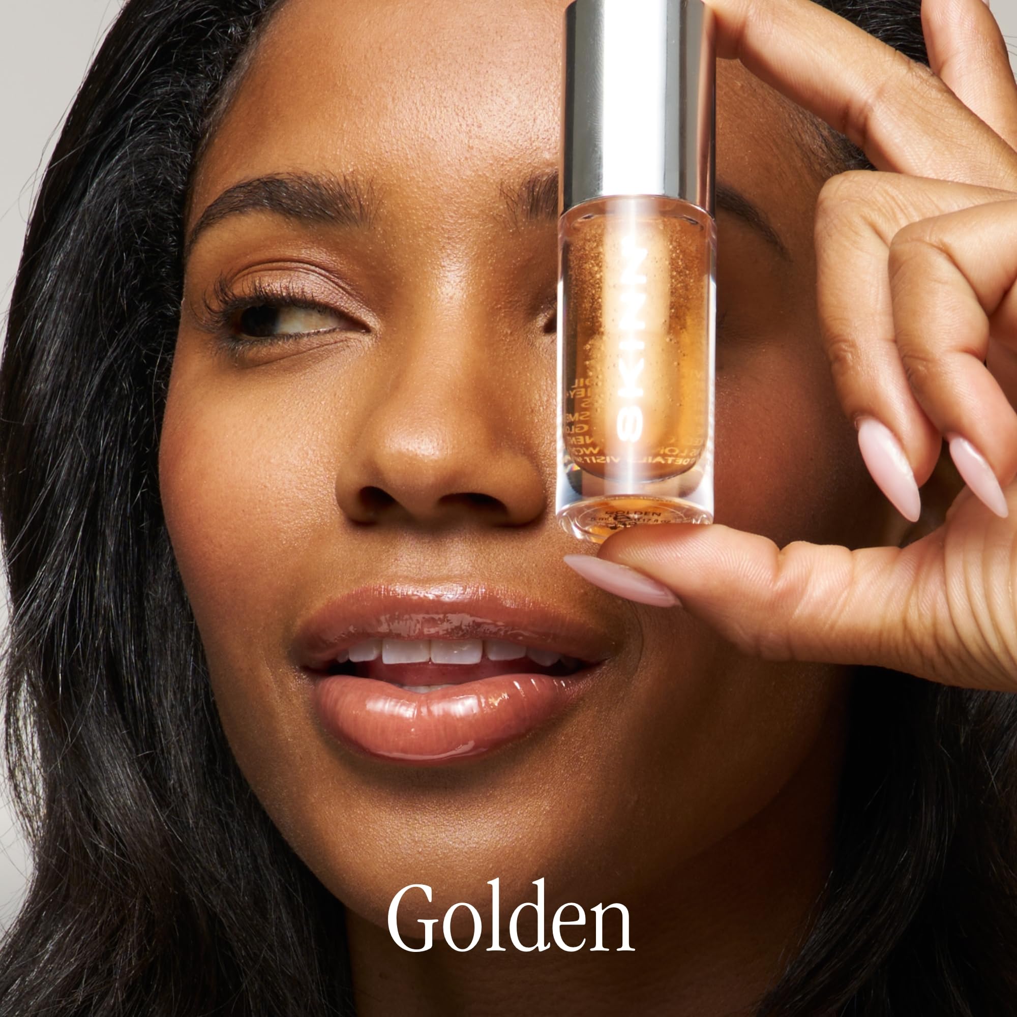 Vitamin C blend in SKINN lip oil for brightness