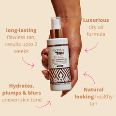 Skinny Tan Tan and Tone Oil spray on skin shows hydration and glow.